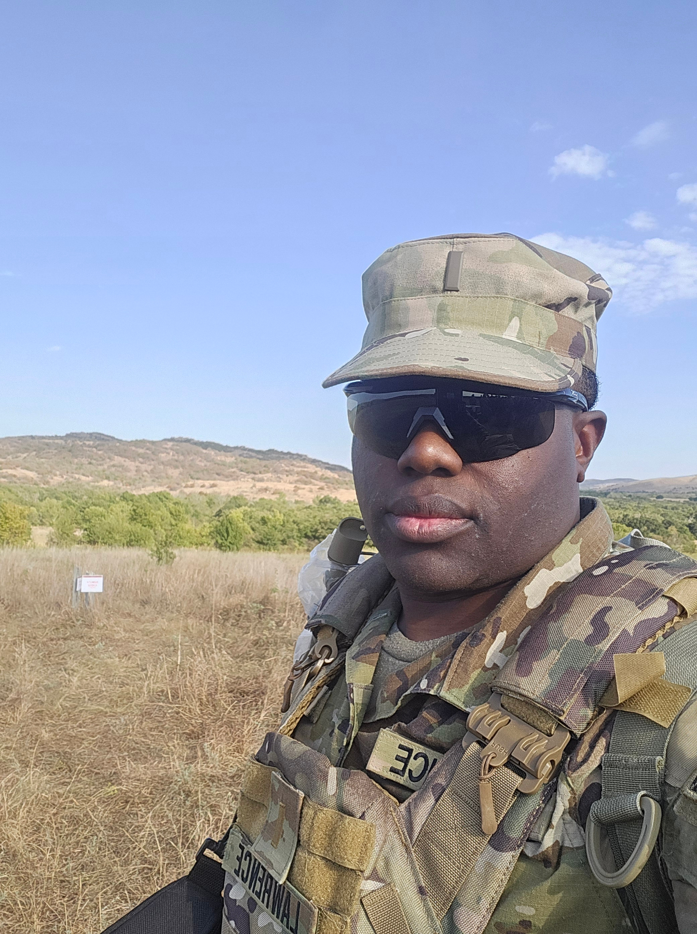 Olardo on patrol in a grassland training environment overseas